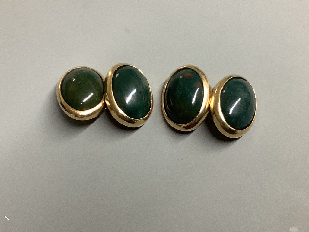 A pair of modern 9ct gold and oval cabochon bloodstone set cufflinks